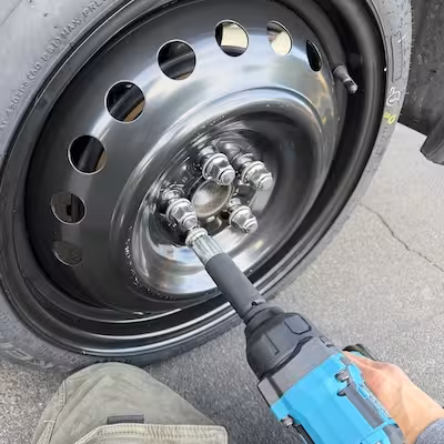 Tire change with impact driver and spare in Sacramento